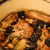 Rabbit stewed in riesling with prunes and pine nuts